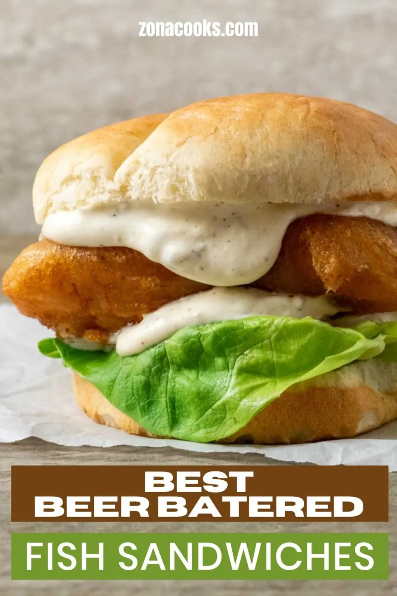 Best Beer Battered Fish Sandwiches on parchment paper.
