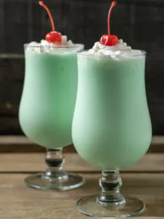 5 Ingredient Mint Shamrock Shakes in two tall glasses.