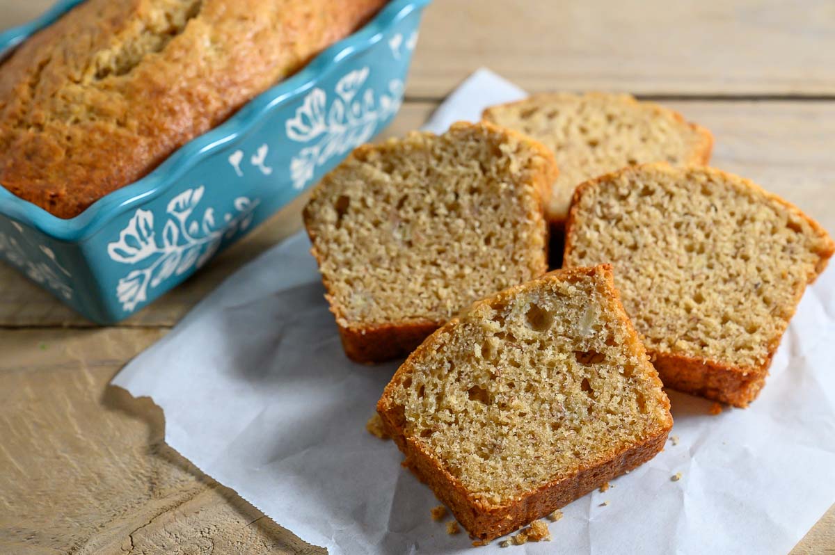 Maui Banana Bread slices on parchment paper.