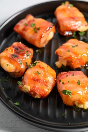 4 Ingredient Glazed Bacon Mozzarella Shrimp on a plate.
