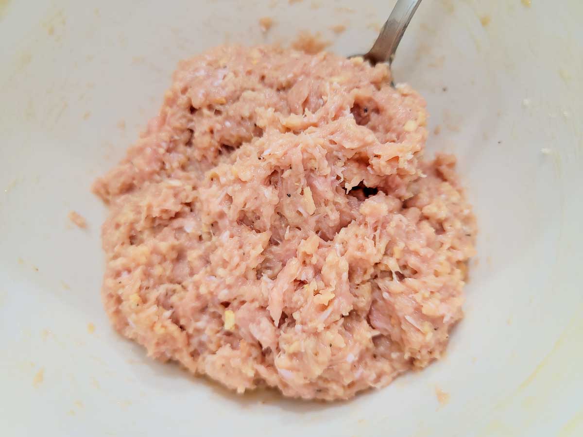 ground turkey meatball mixture in a bowl.