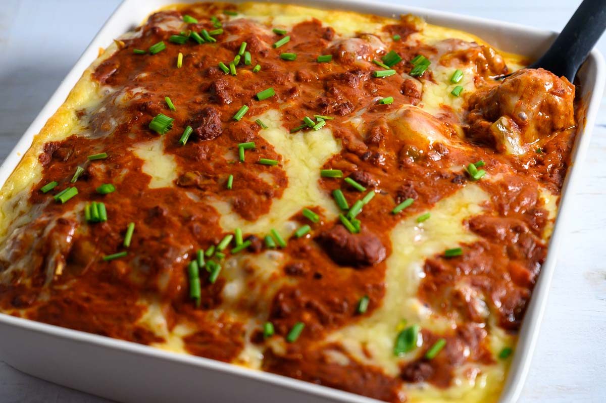 7 Ingredient Enchilada Meatball Casserole in a dish.