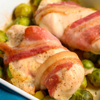 Roasted Chicken and Brussels Sprouts in a baking dish.