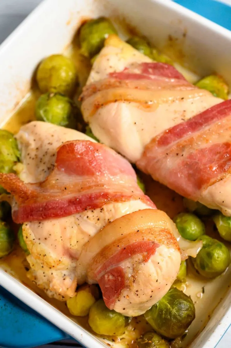 Roasted Chicken and Brussels Sprouts in a baking dish.