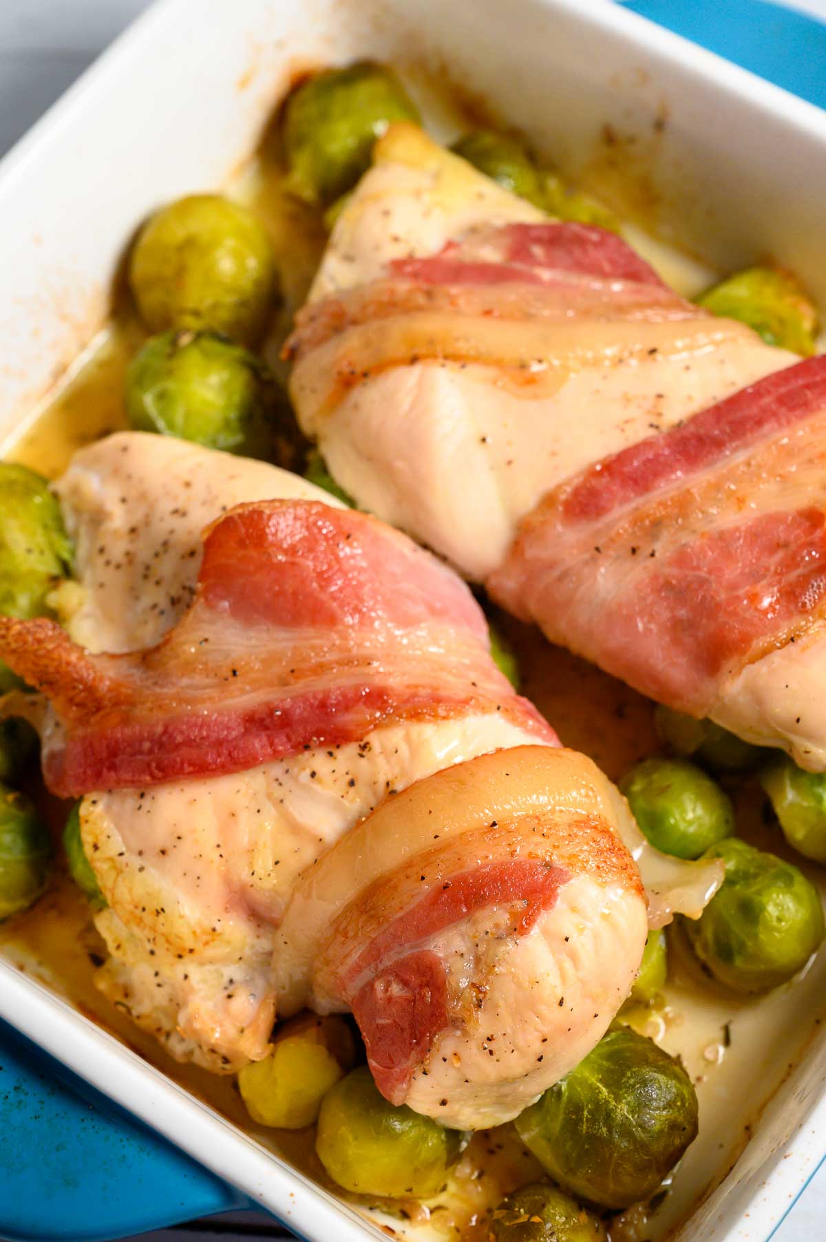 Roasted Chicken and Brussels Sprouts in a baking dish.
