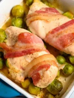 Roasted Chicken and Brussels Sprouts in a baking dish.