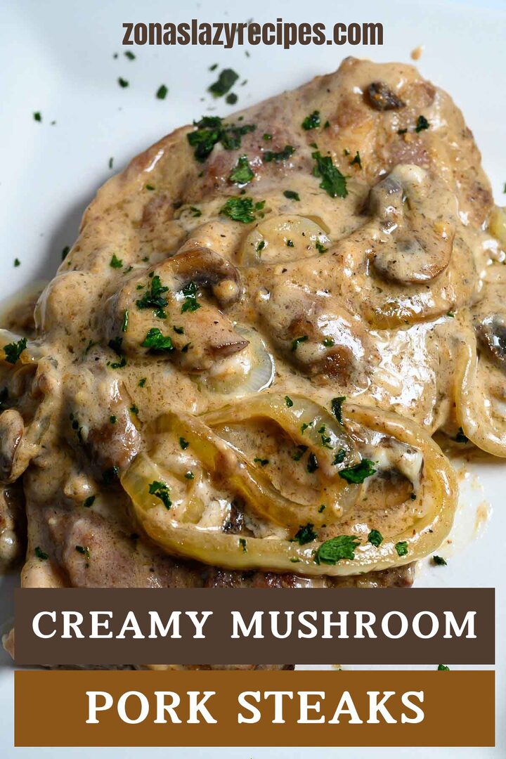 creamy mushroom pork steaks on a plate.