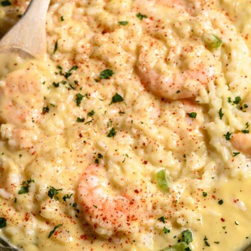 Creamy Shrimp and Rice in a cast iron skillet.