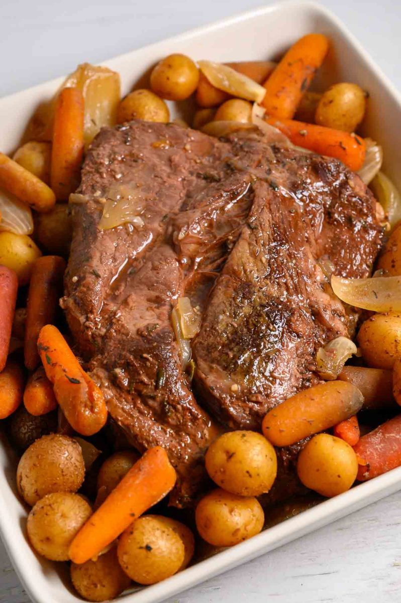 Easy Slow Cooker Pot Roast and Veggies in a dish.