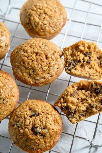Oatmeal Raisin Muffins on a wire rack.