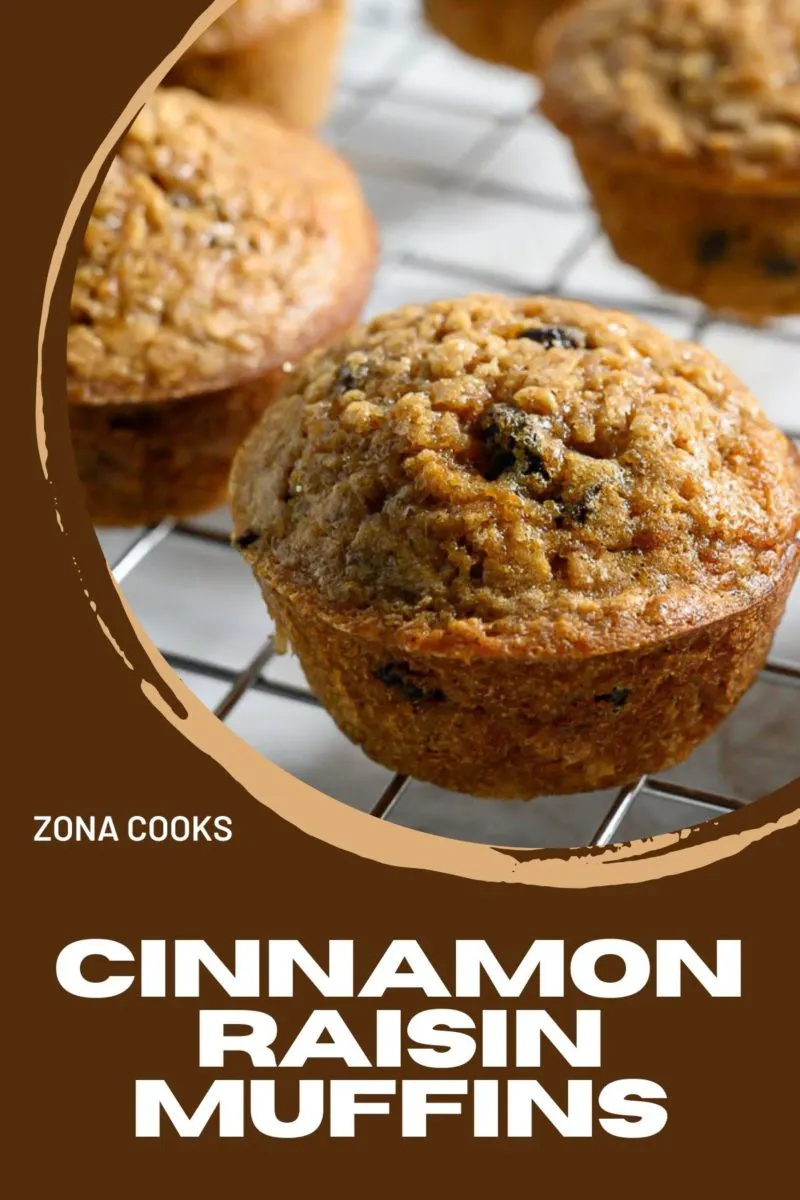 Cinnamon Raisin Muffins on a cooling rack.