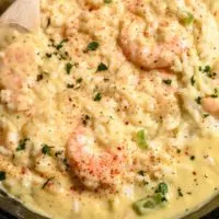 Creamy Shrimp and Rice in a cast iron skillet.