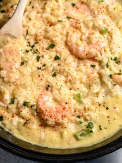 Creamy Shrimp and Rice in a cast iron skillet.