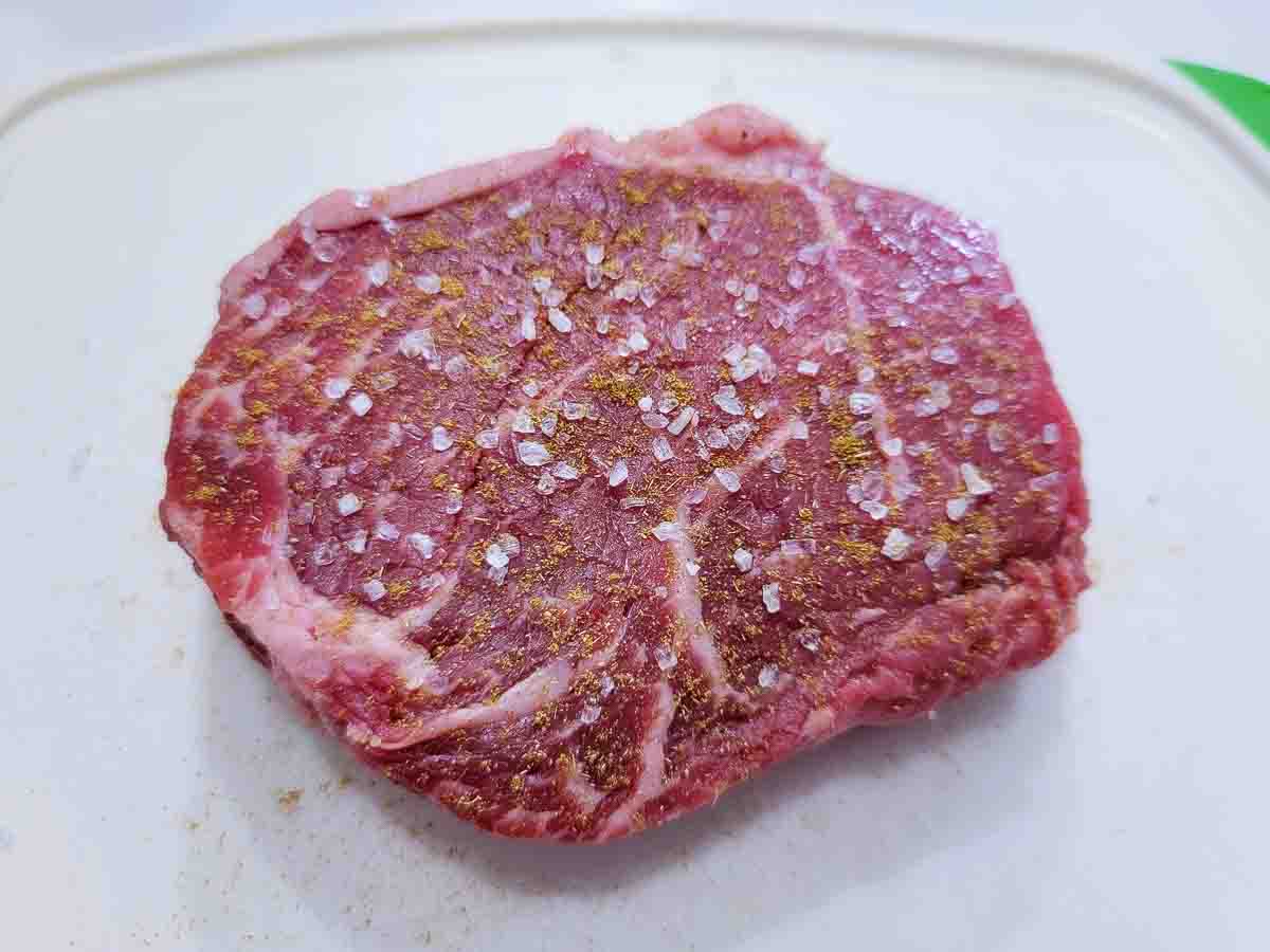 beef tenderloin steak sprinkled with salt and cumin.