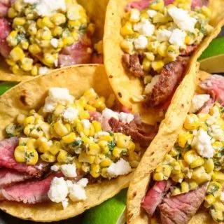 Beef Tenderloin and Elote Tacos on a plate.