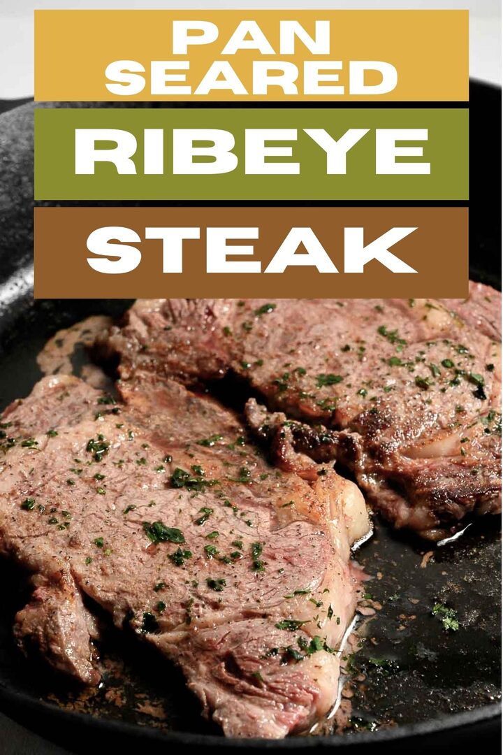pan seared ribeye steak in a cast iron pan.