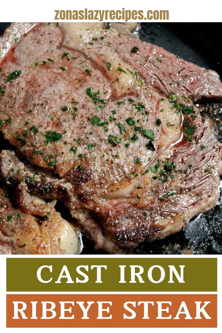 cast iron ribeye steak in a skillet.