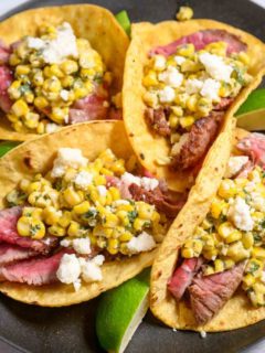 Beef Tenderloin and Elote Tacos on a plate.