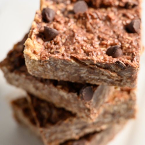 4 Ingredient Peanut Butter Oat Bars in a stack on a plate.