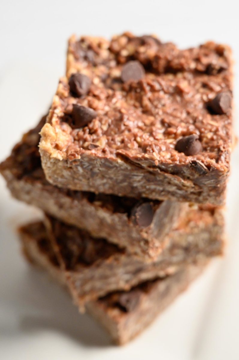 4 Ingredient Peanut Butter Oat Bars in a stack on a plate.