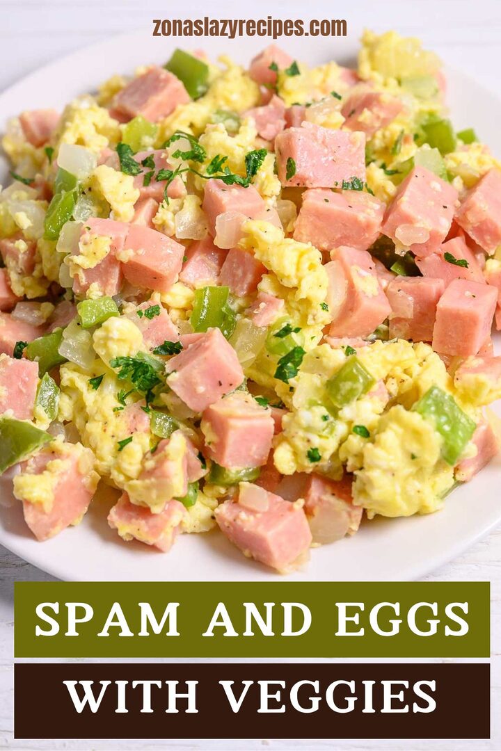spam and eggs with veggies on a plate.