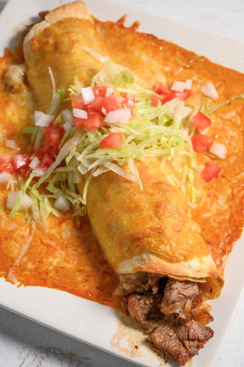 Ribeye Steak Wet Burrito on a plate.