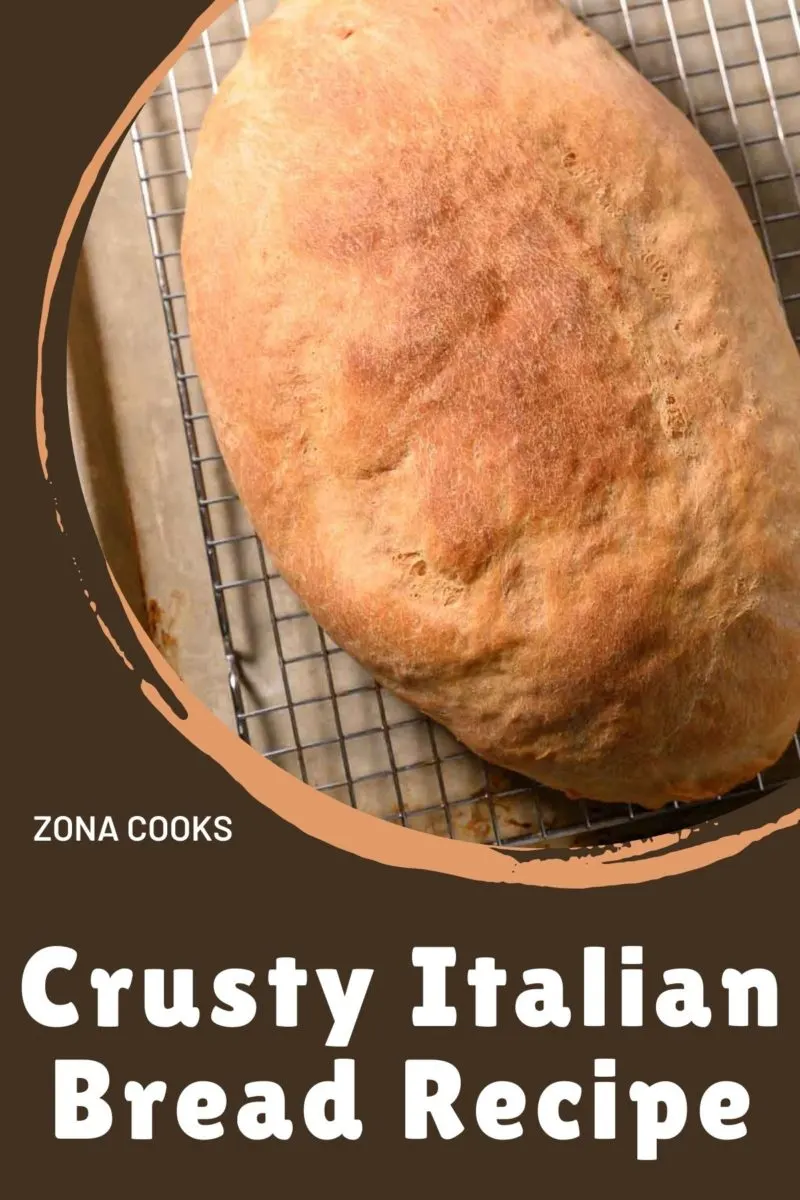 Crusty Italian Bread on a wire rack.