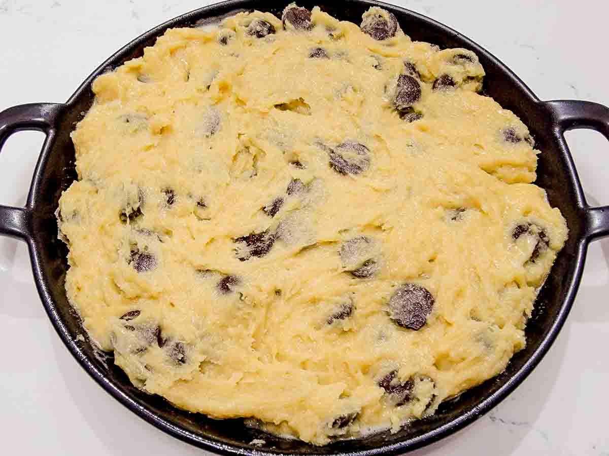 chocolate chip cookie dough spread into an 8 inch skillet.