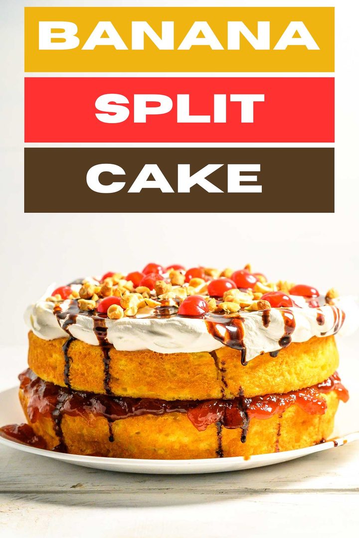 a cake with layers of yellow cake mix, banana pudding, crushed pineapple, strawberry jam, cool whip, chocolate syrup, and maraschino cherries.