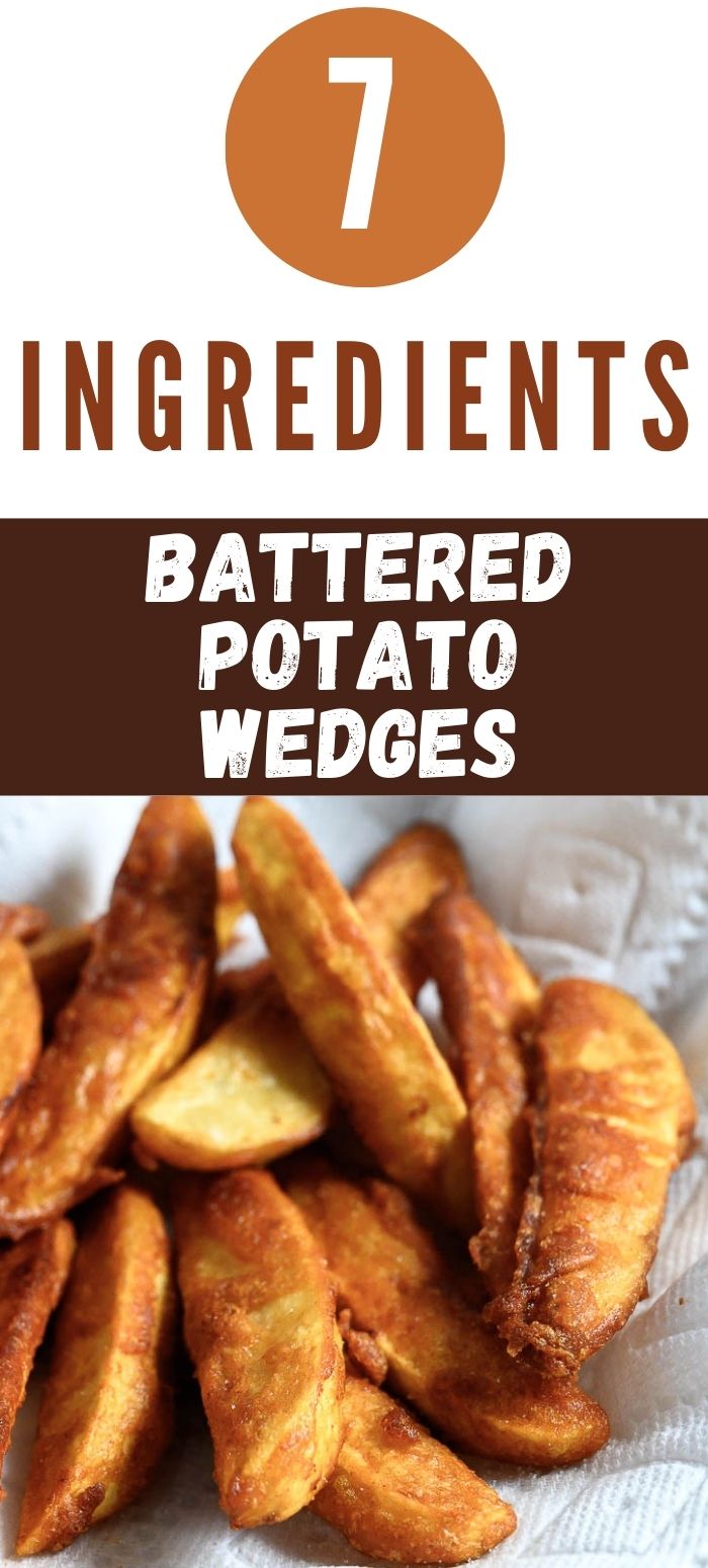 Battered Potato Wedges on paper towel.