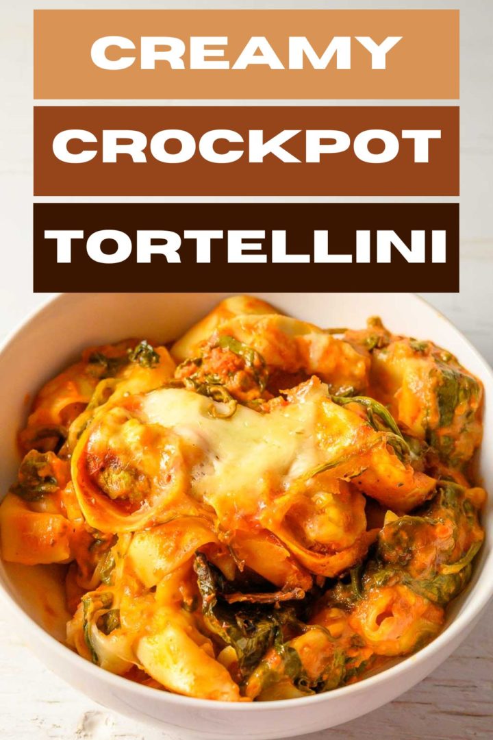 Creamy Crockpot Tortellini with spinach in a bowl.