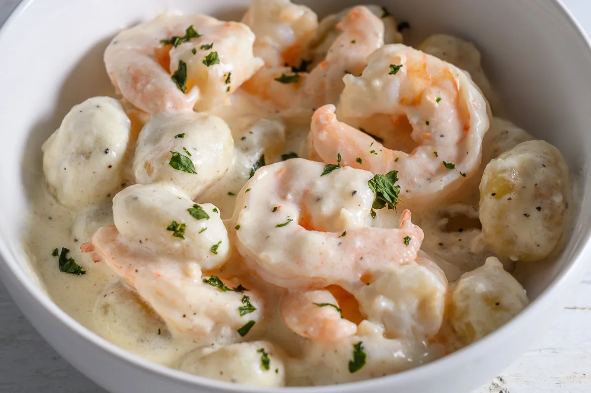Creamy Shrimp Gnocchi Alfredo in a bowl.