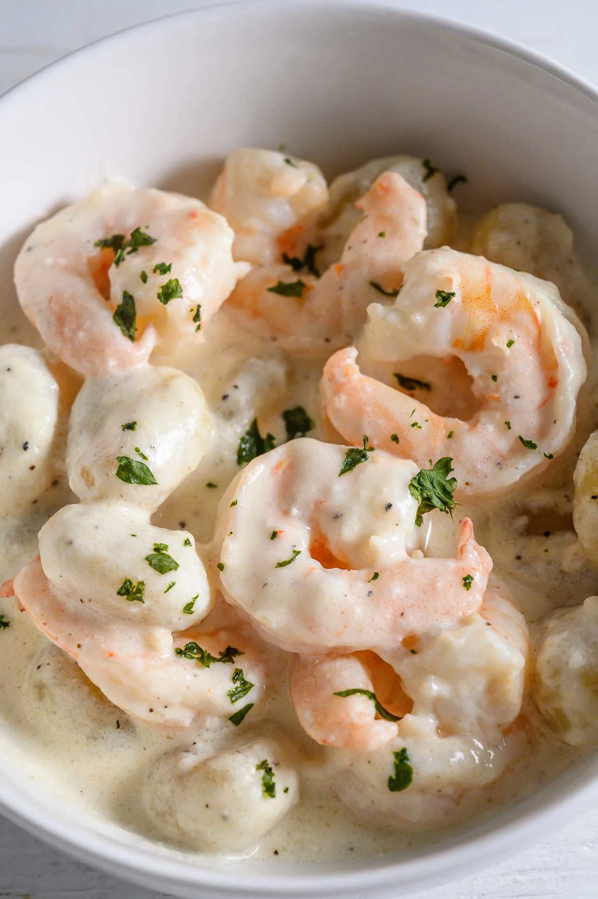 Creamy Shrimp Gnocchi Alfredo in a bowl.