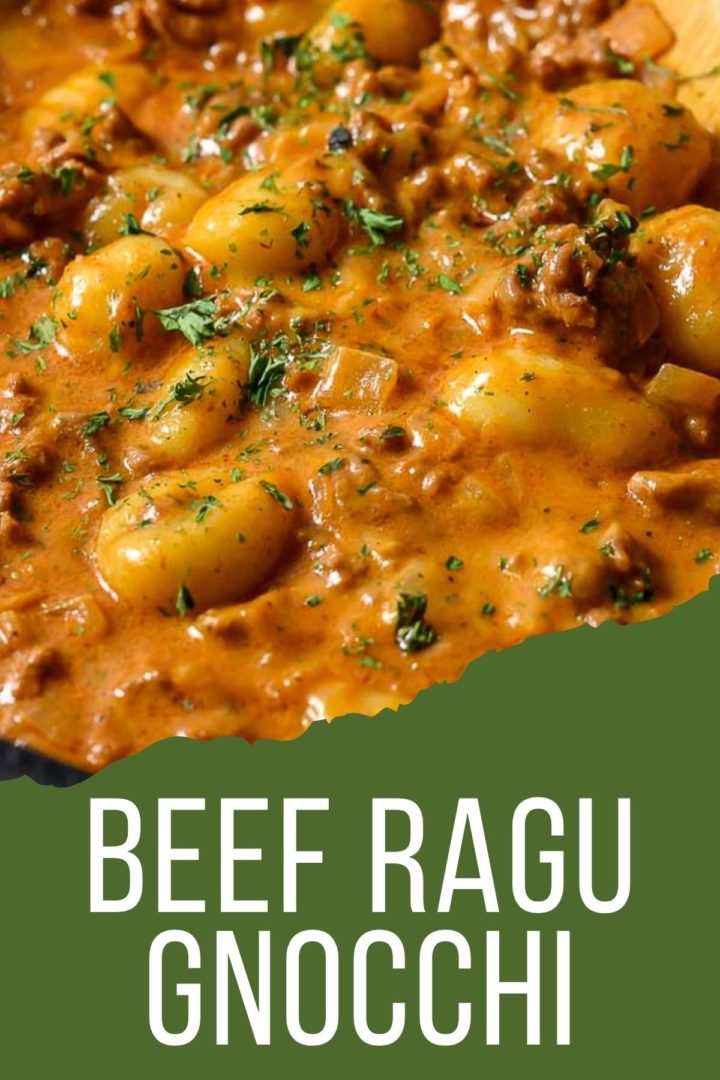 beef ragu gnocchi cooking in a pan.