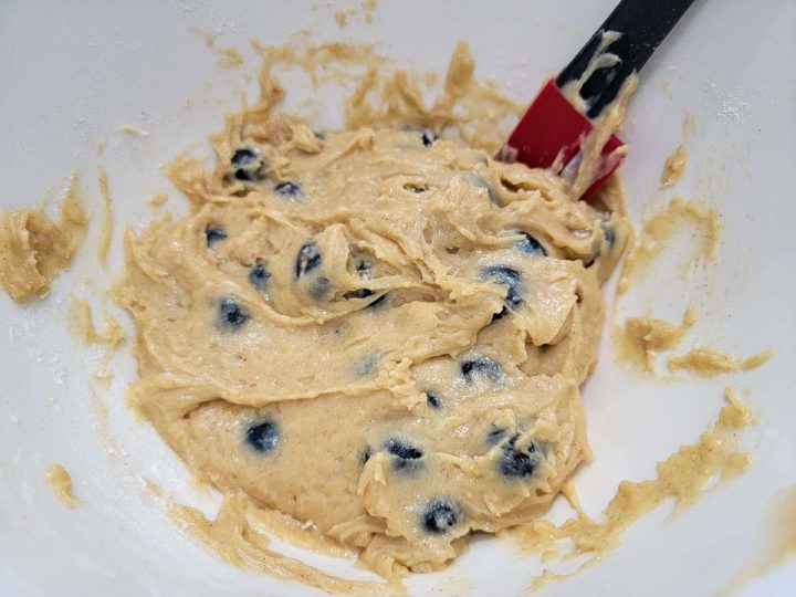 blueberry muffin batter mixed in a bowl.
