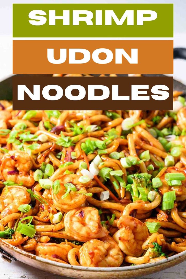chewy udon noodles, tender shrimp, broccoli slaw, and stir fry sauce in a frying pan.