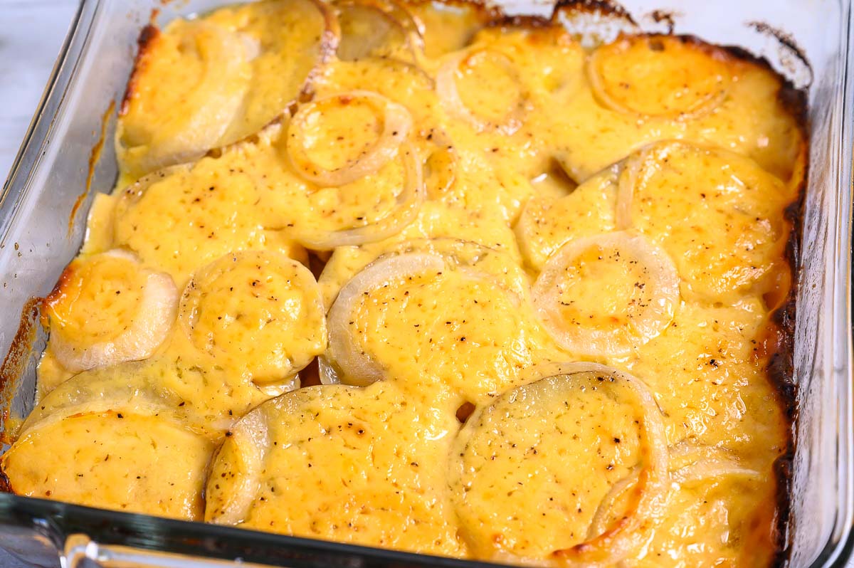 au gratin potatoes and onions in a baking dish.