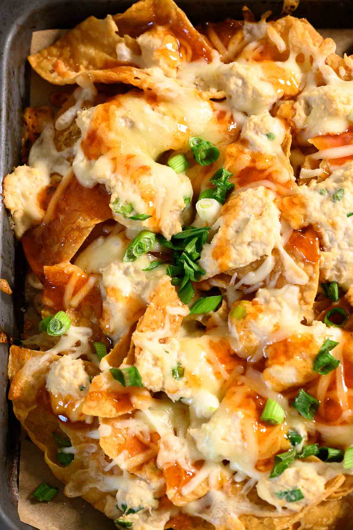 Crab Rangoon Nachos on a baking sheet.