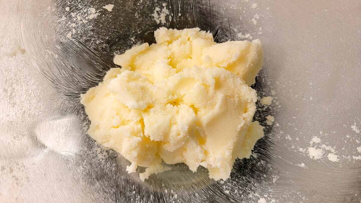butter and sugar creamed in a mixing bowl.