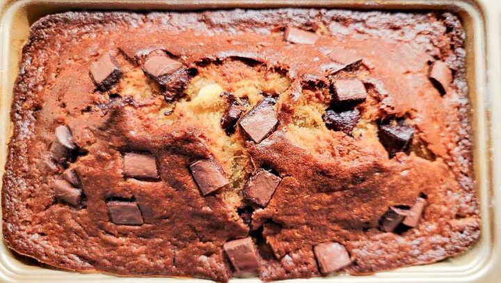 chocolate chunk banana bread baked in a loaf pan.